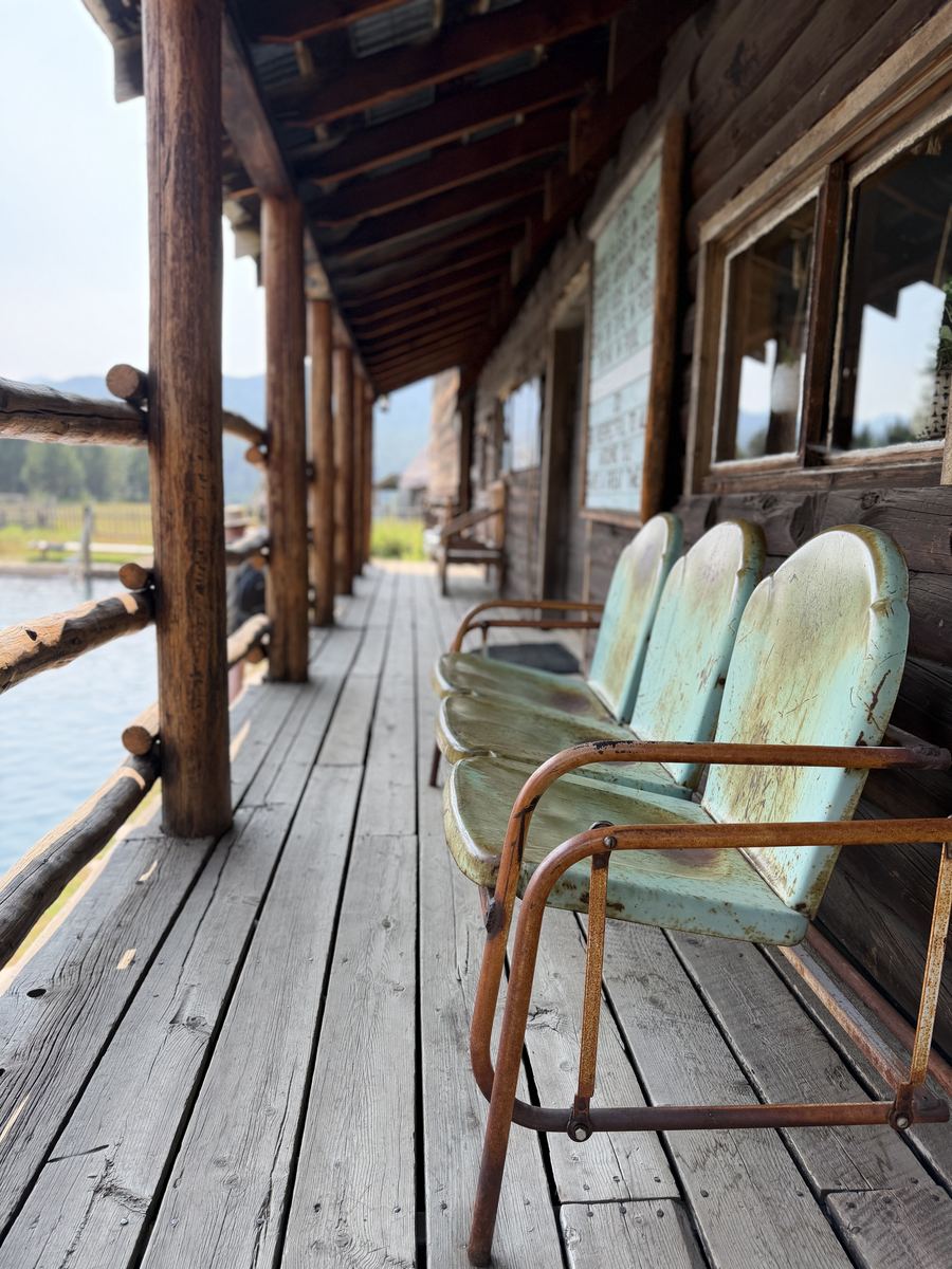 Vintage chairs on a lakeside porch, Idaho